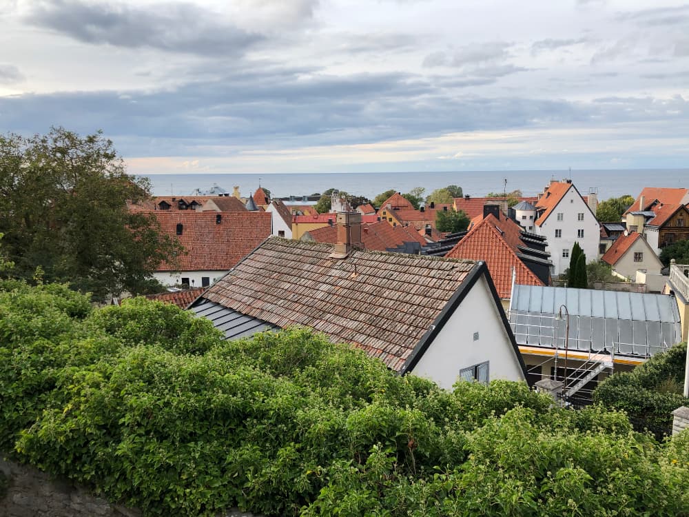 Red clay tile rooftops of buildings in Visby.