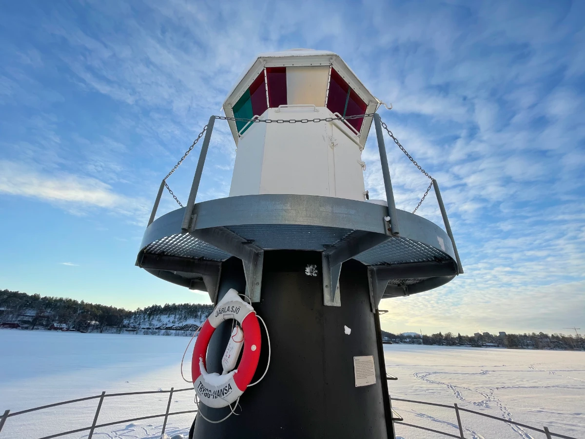 Nacka lighthouse on frozen lake