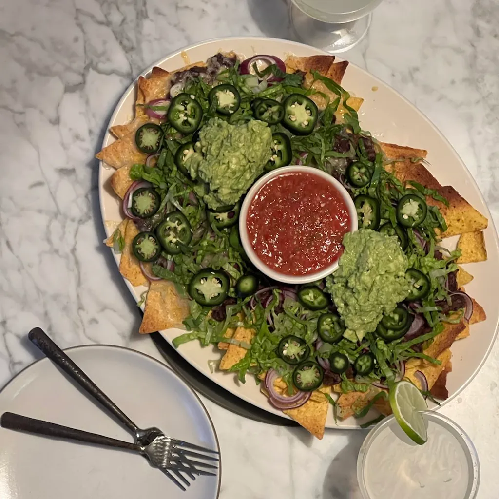 nachos on a white plate