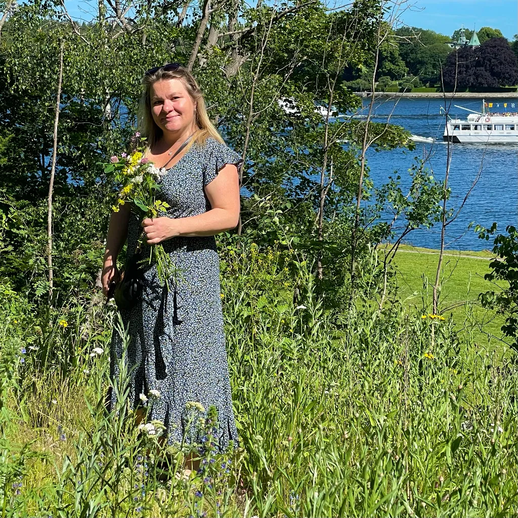 Karin picking wildflowers