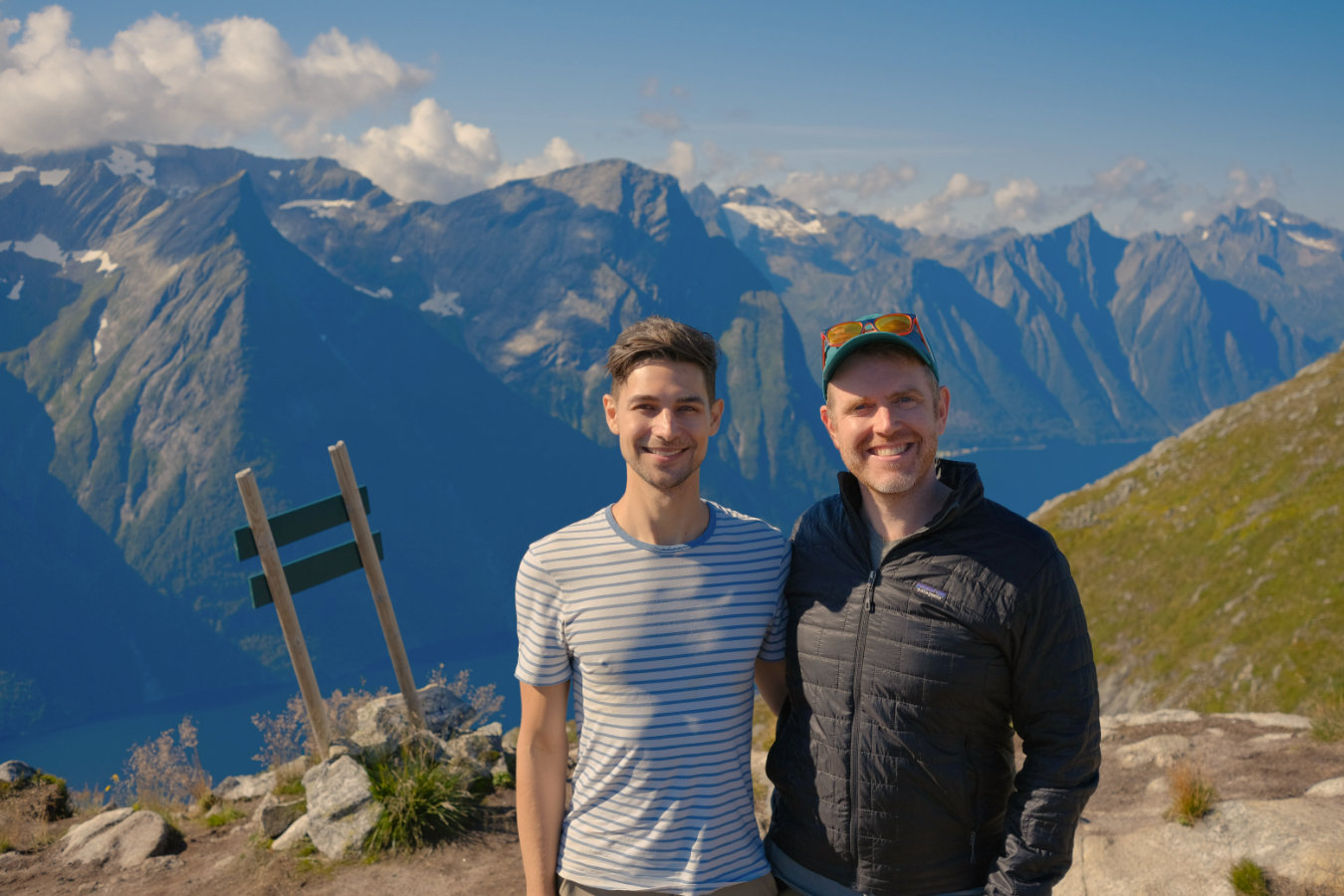 Jeremiah and Arthur smiling standing on mountaintop in Norge